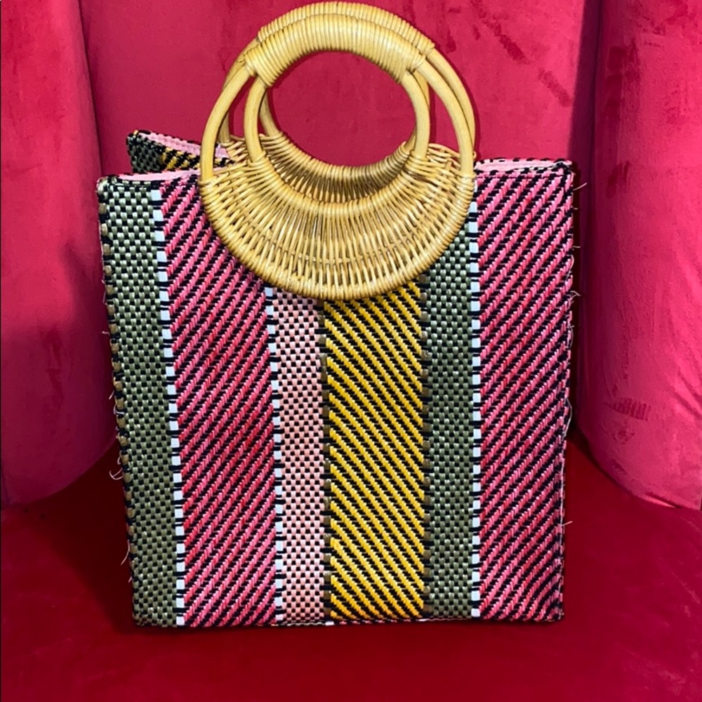 Multi colored top handle bag